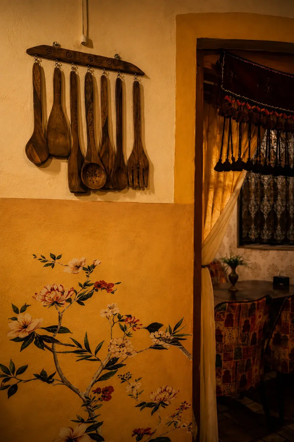 Hand-painted florals along the wall beside the doorway