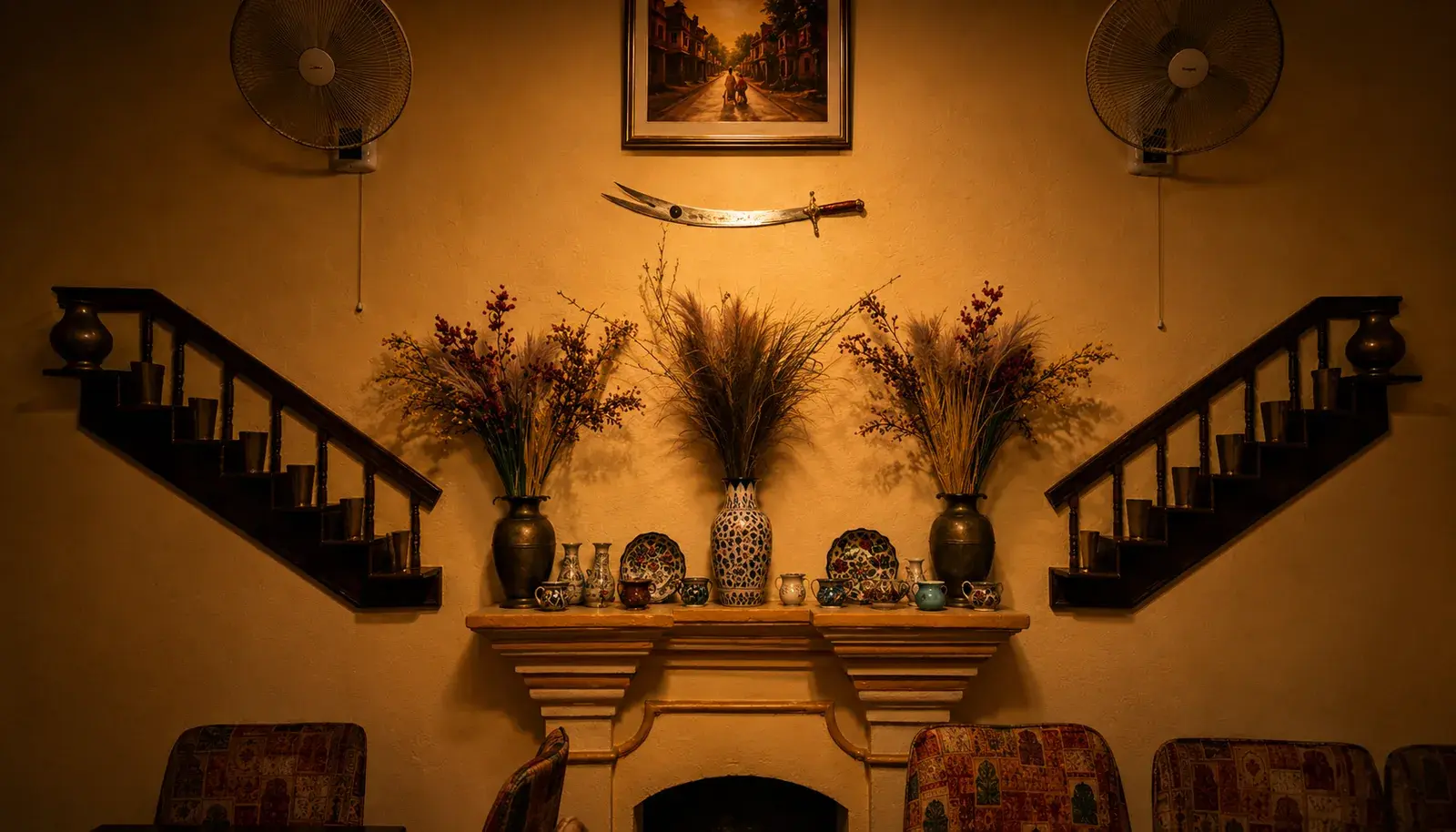 The mantel and its vases between the twin staircases
